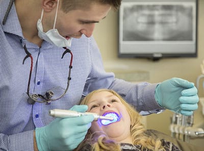 dentist working on child