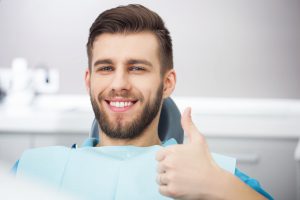 man getting exam for receding gums