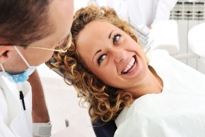 woman waking up from sedation dentistry
